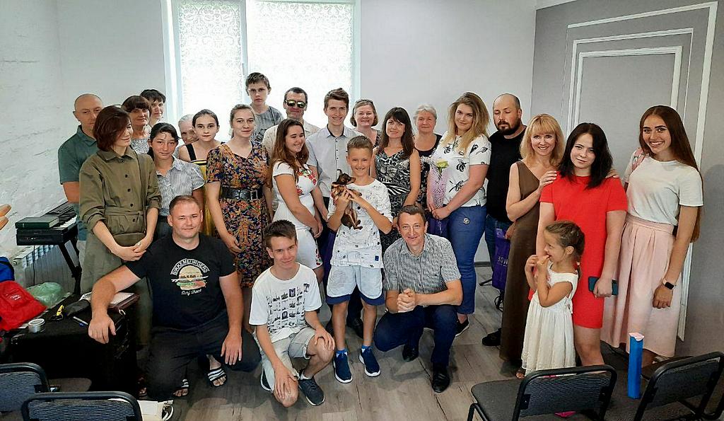 В Днепре крестили четырех молодых людей